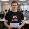 Black graphic tee with "Taxed Until I'm Red White and Broke" funny patriotic tax humour slogan t-shirt