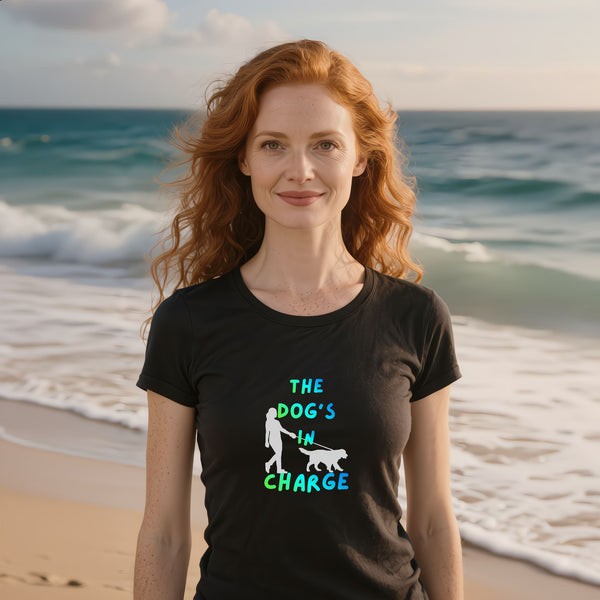 The Dog's In Charge funny dog owner t-shirt in black — bold graphic tee for dog moms and pet parents