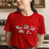 Red funny days of the week t-shirt featuring snail to horse animal print – bold graphic tee for humour and animal fans