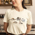 Soft cream animal week t-shirt with snail Monday to horse Friday design – cute quirky gift tee for dog lovers and humour fans