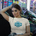 Procras-tn8r Badge Tee in Soft Cream – Casual Funny Slogan Shirt for Procrastination Fans