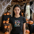 Black Trick Treat Nap Repeat Halloween T-shirt with a playful slogan for trick-or-treating and autumn outings