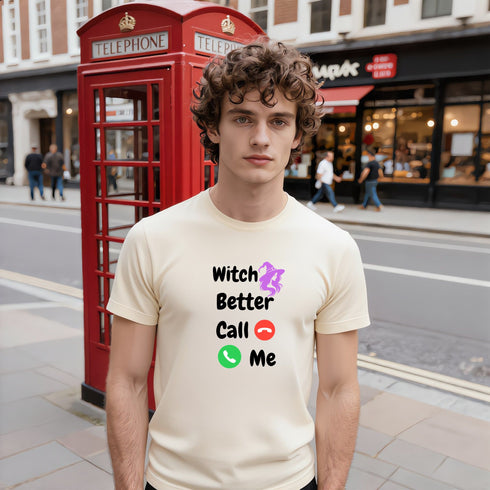 Soft Cream witch slogan T-shirt worn by a model, with black Witch Better Call Me lettering, a purple witch and colourful call symbols.