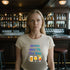 Soft cream cotton tee showing close-up detail of the "Witch Way to the Bar" witch slogan artwork on soft breathable fabric