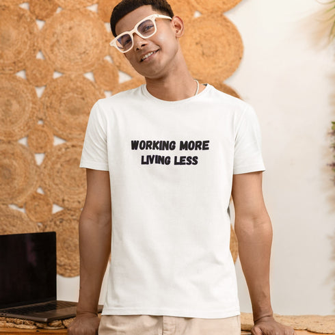 Working More Living Less funny work life balance t-shirt in white — standout graphic tee for the daily grind survivor