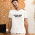 Working More Living Less funny work life balance t-shirt in white — standout graphic tee for the daily grind survivor